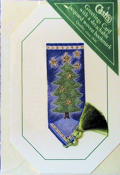 Cash's greeting card, with an attached woven bookmark of a Christmas tree with seven stars, but no words.