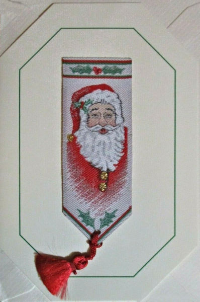 Cash's greeting card, with an attached woven bookmark with image of Father Christmas, but no words.