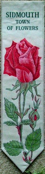 Cash's woven bookmark with woven title and image of a rose
