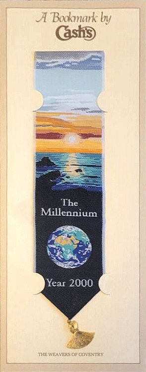 J & J Cash woven bookmark, with title words, and view of a sun rise over the sea