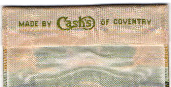 woven J & J Cash name on reverse top turnover of this bookmark