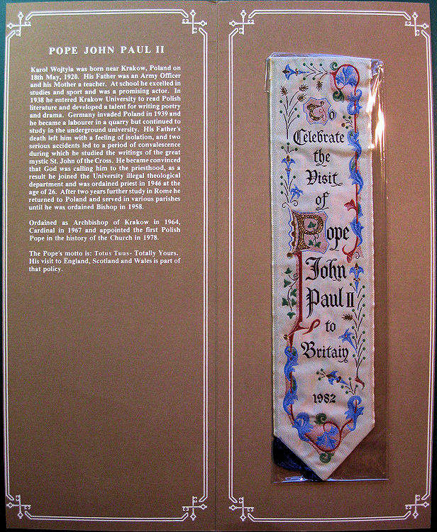 J & J Cash woven bookmark, with ornate design and title words only