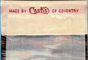 woven name of Cash's on the reverse top turnover of this bookmark