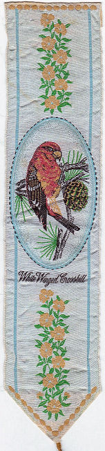 J & J Cash woven bookmark, with picture of a bird, and title words