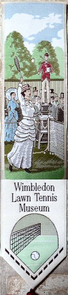 J & J Cash woven bookmark, with title words and image of a lady tennis player