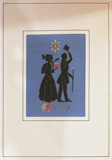 J & J Cash woven Christmas card, with title word and image of a silhouette couple