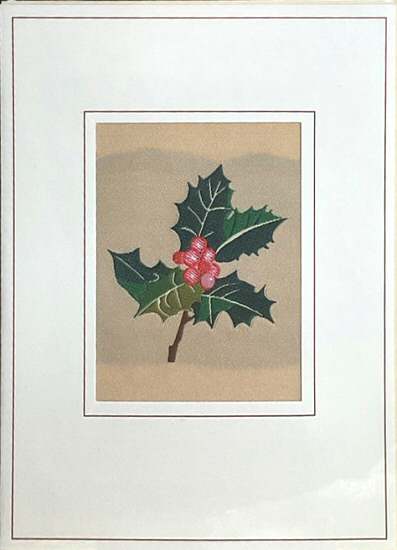 J & J Cash woven Christmas card, with no words, just image of holly and berries