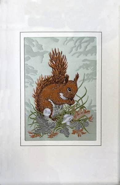 J & J Cash woven card, with no words, but picture of a squirrel