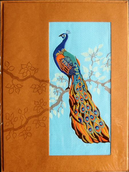 J & J Cash woven picture of a Peacock on a branch