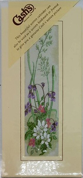 J & J Cash woven bookmark with a 1995 calendar printed on the reverse of the card
