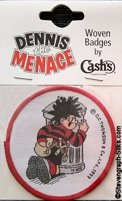 J & J Cash woven saw-on badge featuring Dennis The Menace