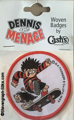 J & J Cash woven saw-on badge featuring Dennis The Menace