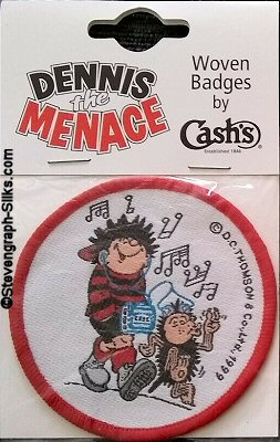 J & J Cash woven saw-on badge featuring Dennis The Menace