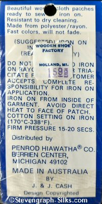 J & J Cash woven saw-on label reverse