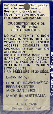 J & J Cash woven saw-on label reverse