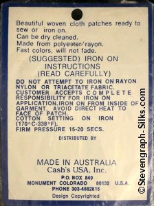 J & J Cash woven saw-on label reverse