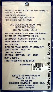 J & J Cash woven saw-on label reverse