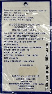 J & J Cash woven saw-on label reverse