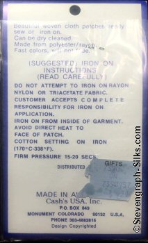 J & J Cash woven saw-on label reverse