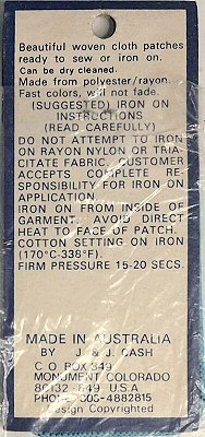 J & J Cash woven saw-on label reverse