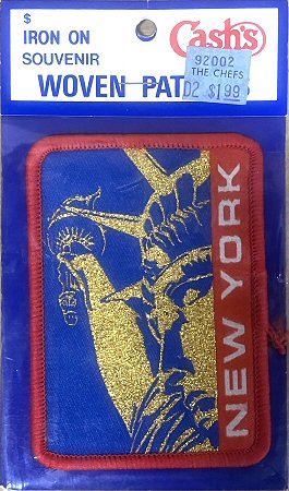 J & J Cash woven saw-on label with words: New York