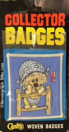 J & J Cash woven saw-on label words: Collector Badges