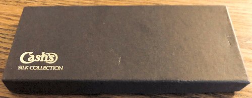 J & J Cash cardboard presentation box in which these glasses cases were sold