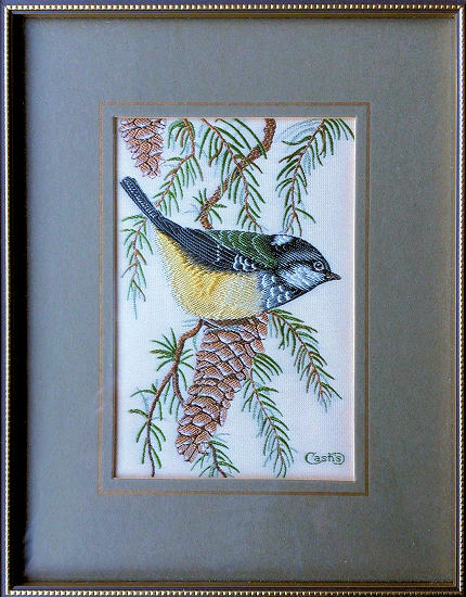 J & J Cash woven picture of a bird, with no words, but image of a Coal Tit