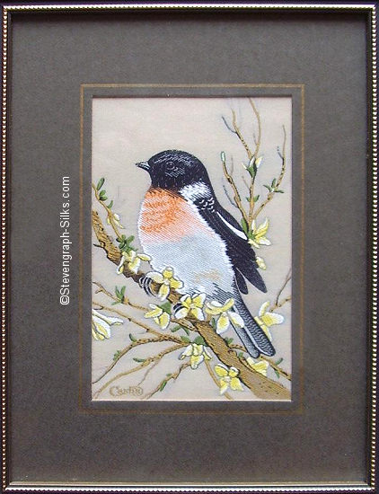 J & J Cash woven picture of a bird, with no words, but image of a Stonechat