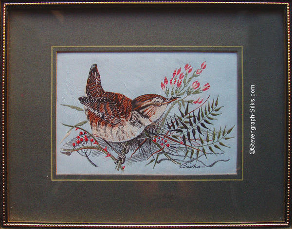 J & J Cash woven picture of a bird, with no words, but image of a Wren