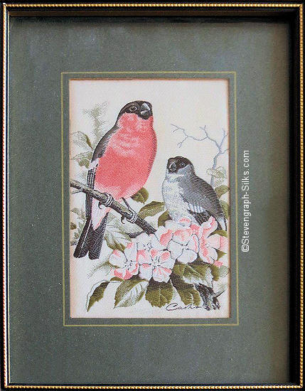 J & J Cash woven picture of a bird, with no words, but image of two Bullfinch