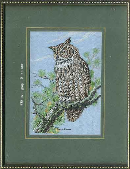 J & J Cash woven picture of a bird, with no words, but image of a Great Horned Owl