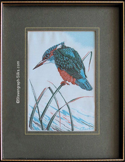 J & J Cash woven picture of a bird, with no words, but image of a Kingfisher