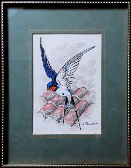 J & J Cash woven picture of a bird, with no words, but image of a Swallow