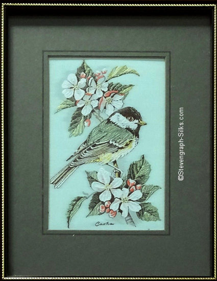 J & J Cash woven picture of a bird, with no words, but image of a Black Capped Chickadee