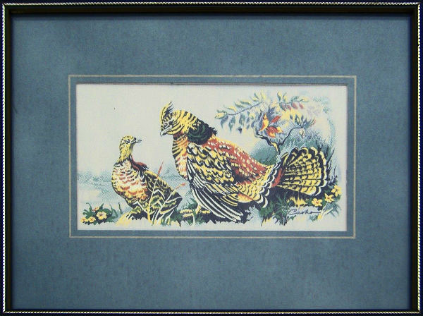 J & J Cash woven picture of a male and female GROUSE