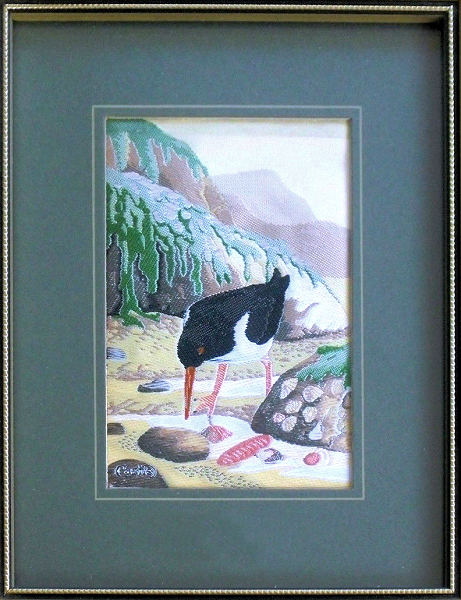 J & J Cash woven picture of a bird, with no words, but image of an Oystercatcher