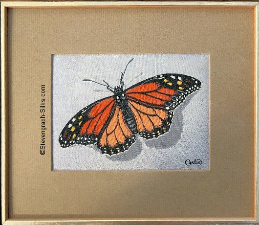 J & J Cash woven picture with no words, but image of a Monarch butterfly only