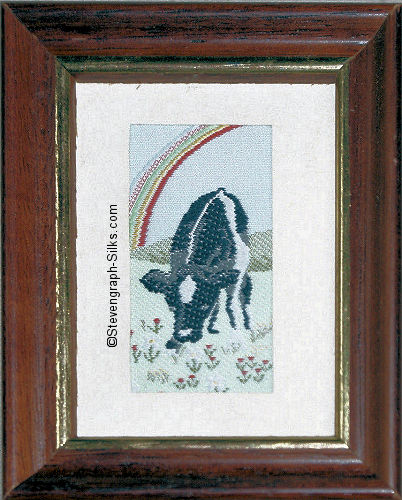 J & J Cash woven picture with image of a Cow