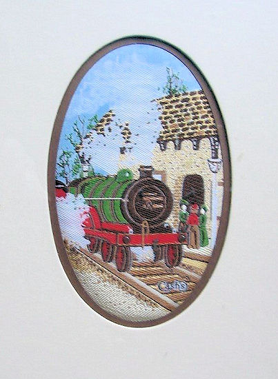 J & J Cash small oval centred woven picture with image of a railway steam engine