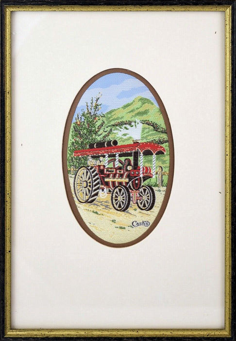 J & J Cash small oval centred woven picture with image of a steam powered traction engine