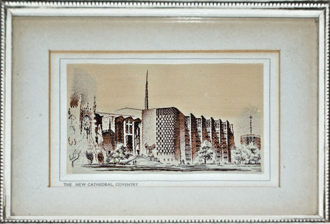 J & J Cash woven picture with title words printed below the tapestry
