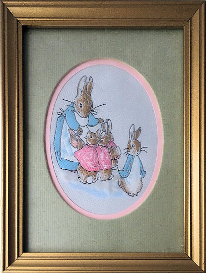 J & J Cash un-glazed woven padded picture with Peter Rabbit and family