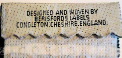 woven name at top turn-over of bookmark