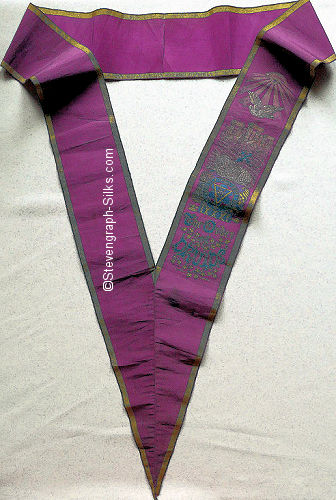 full viw of collar sash with images of typical symbols