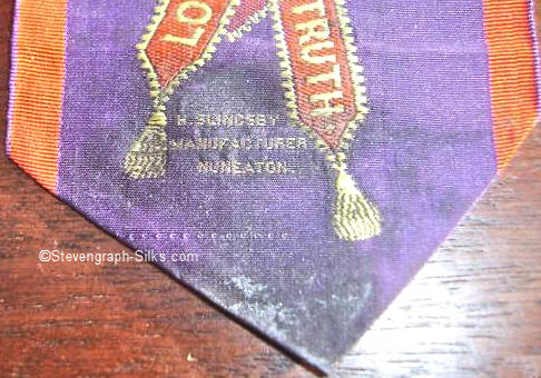 woven credit on front pointed end of this bookmark