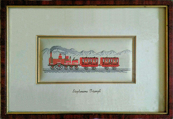 Framed woven picture of Stephensons Triumph steam engine