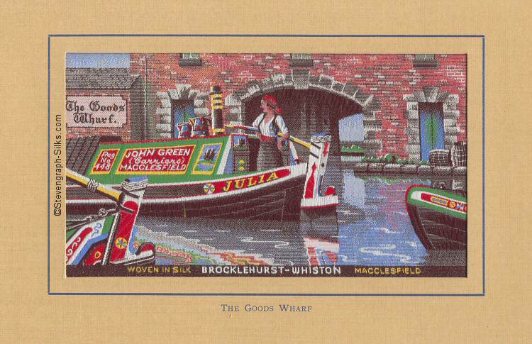 View of The Goods Wharf Macclesfield, with a John Green canal boat called "Julia" and a lady at the tiller
