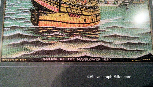 close up ov words woven at the bottom of the original silk picture