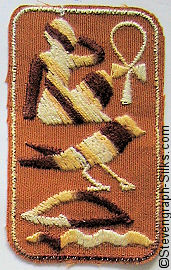 loose silk with image of egyptian hieroglyphics